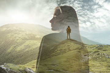 Image showing Silhouette of businesswoman with landscapes on background, double exposure.