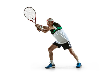 Image showing Senior man playing tennis in sportwear isolated on white background