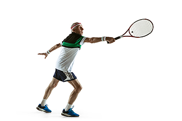 Image showing Senior man playing tennis in sportwear isolated on white background