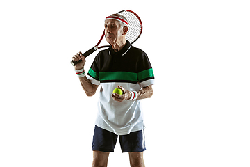 Image showing Senior man playing tennis in sportwear isolated on white background