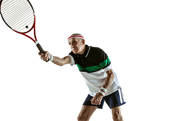 Image showing Senior man playing tennis in sportwear isolated on white background