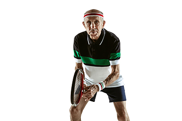 Image showing Senior man playing tennis in sportwear isolated on white background