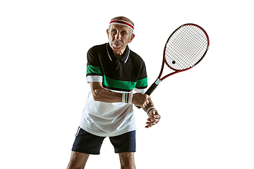 Image showing Senior man playing tennis in sportwear isolated on white background