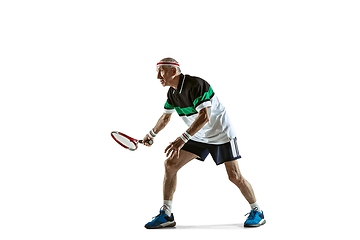 Image showing Senior man playing tennis in sportwear isolated on white background