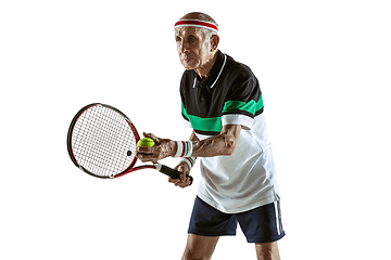 Image showing Senior man playing tennis in sportwear isolated on white background