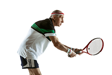 Image showing Senior man playing tennis in sportwear isolated on white background