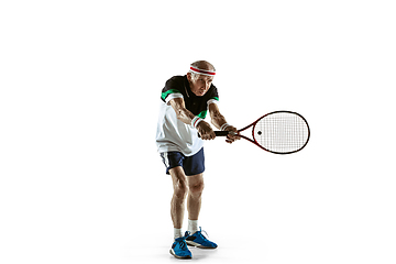 Image showing Senior man playing tennis in sportwear isolated on white background