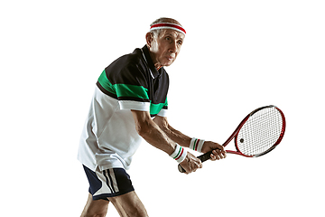 Image showing Senior man playing tennis in sportwear isolated on white background