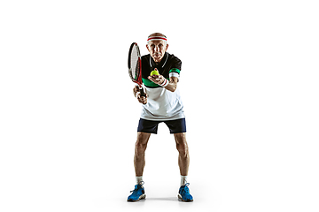 Image showing Senior man playing tennis in sportwear isolated on white background