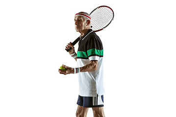 Image showing Senior man playing tennis in sportwear isolated on white background