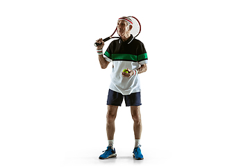 Image showing Senior man playing tennis in sportwear isolated on white background