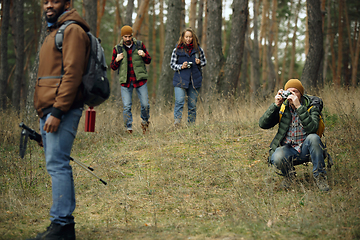 Image showing Group of friends on a camping or hiking trip in autumn day