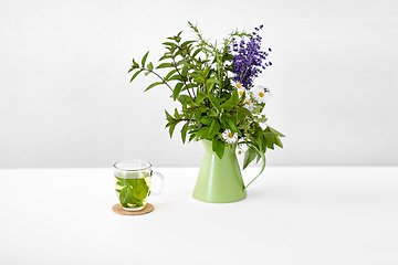 Image showing herbal tea and flowers in jug