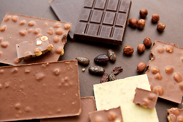 Image showing chocolate bars with hazelnuts and cocoa beans