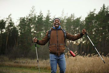 Image showing Young man on a camping or hiking trip in autumn day