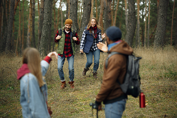 Image showing Group of friends on a camping or hiking trip in autumn day