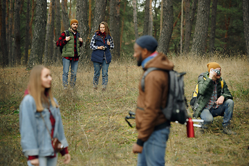 Image showing Group of friends on a camping or hiking trip in autumn day