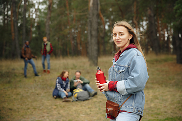 Image showing Group of friends on a camping or hiking trip in autumn day