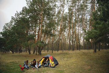 Image showing Group of friends on a camping or hiking trip in autumn day