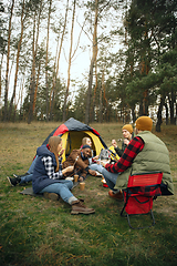 Image showing Group of friends on a camping or hiking trip in autumn day