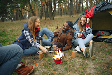 Image showing Group of friends on a camping or hiking trip in autumn day