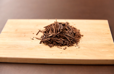 Image showing chocolate chips on wooden board