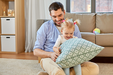 Image showing father with little baby daughter at home