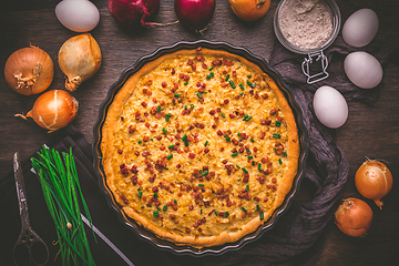 Image showing Homemade onion tart or pie with bacon and chives