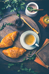 Image showing Breakfast - Croissants with nuts and cup of coffee