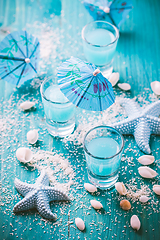 Image showing Blue shots for summer with seashells on blue background