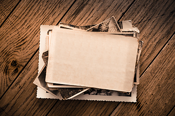 Image showing Memories - stock of old and vintage photos on wooden background