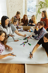 Image showing Young people discussing about women rights and equality at the office