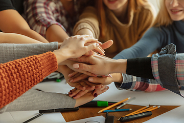 Image showing Young people discussing about women rights and equality at the office