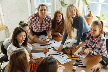 Image showing Young people discussing about women rights and equality at the office