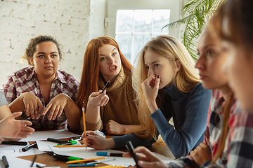 Image showing Young people discussing about women rights and equality at the office