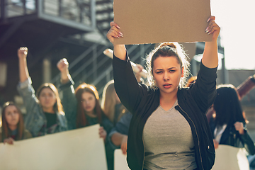 Image showing Young people protesting of women rights and equality on the street