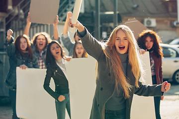 Image showing Young people protesting of women rights and equality on the street