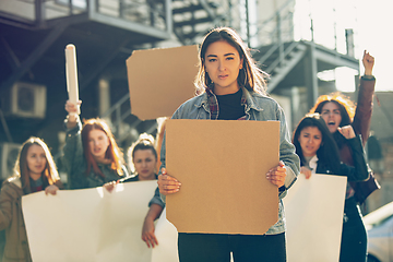 Image showing Young people protesting of women rights and equality on the street