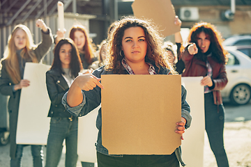 Image showing Young people protesting of women rights and equality on the street