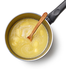 Image showing water, melted butter and salt in a pot