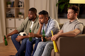 Image showing sad male friends or soccer fans with beer at home