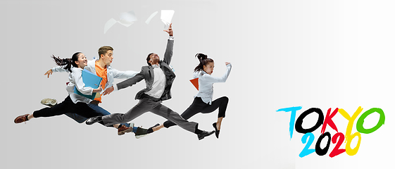 Image showing Office workers or ballet dancers jumping on white background