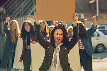 Image showing Young people protesting of women rights and equality on the street