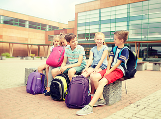 Image showing group of happy elementary school students talking