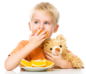 Image showing Portrait of a little boy with his teddy bear