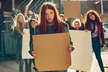 Image showing Young people protesting of women rights and equality on the street