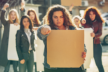 Image showing Young people protesting of women rights and equality on the street