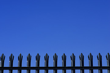 Image showing Tops of metal palisade fencing