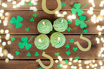 Image showing green cupcakes, horseshoes and shamrock