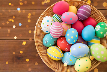 Image showing close up of colored easter eggs in basket